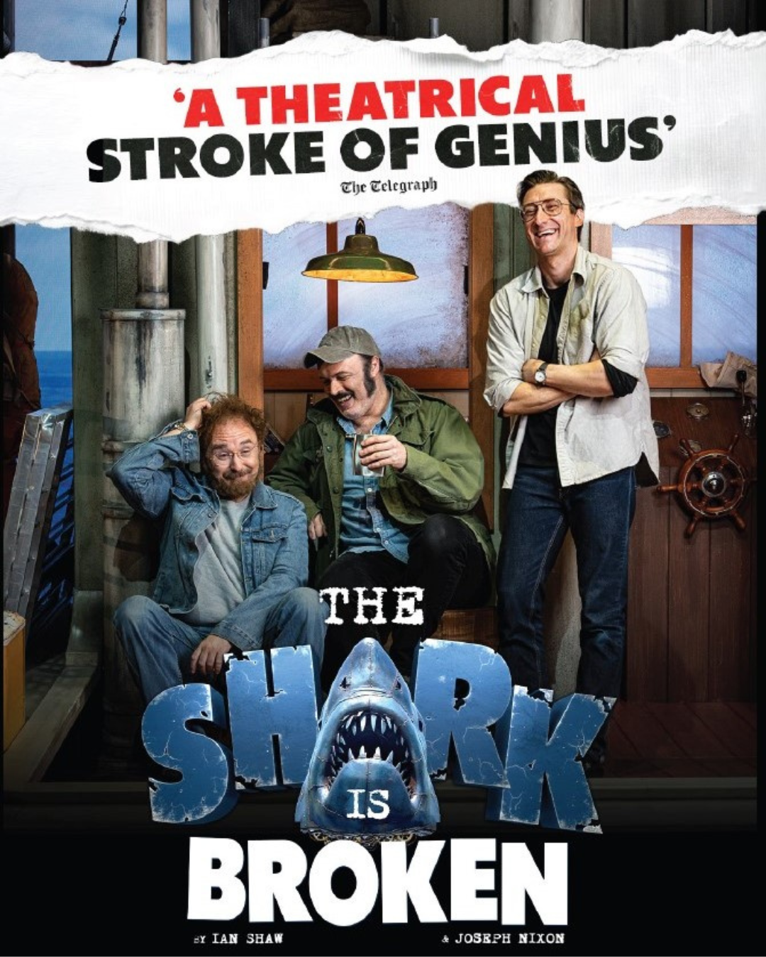 Poster showing three laughing men aboard a boat above a large shark graphic and the title The Shark Is Broken.